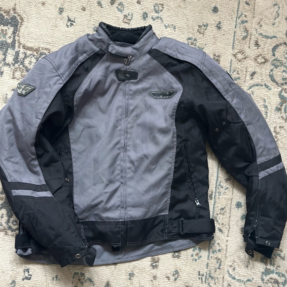 Grey and black Fly Racing jacket